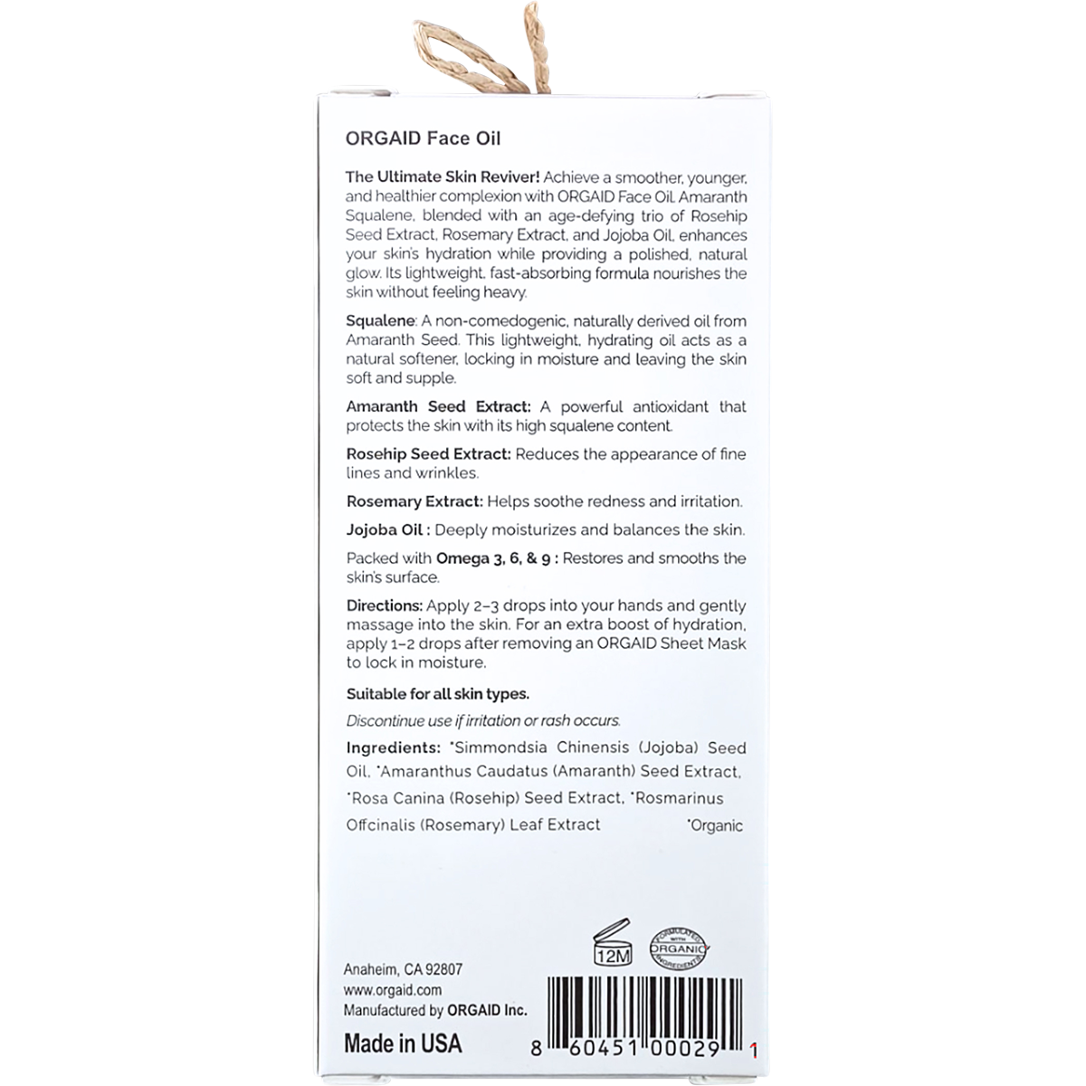 Back of Orgaid Organic Face Oil box showing ingredients, usage directions, and a minimalist black and white design.