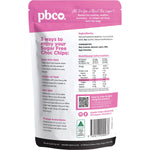 Back of PBco Chocolate Chips 220g bag showing nutritional information and ingredients on a white background.