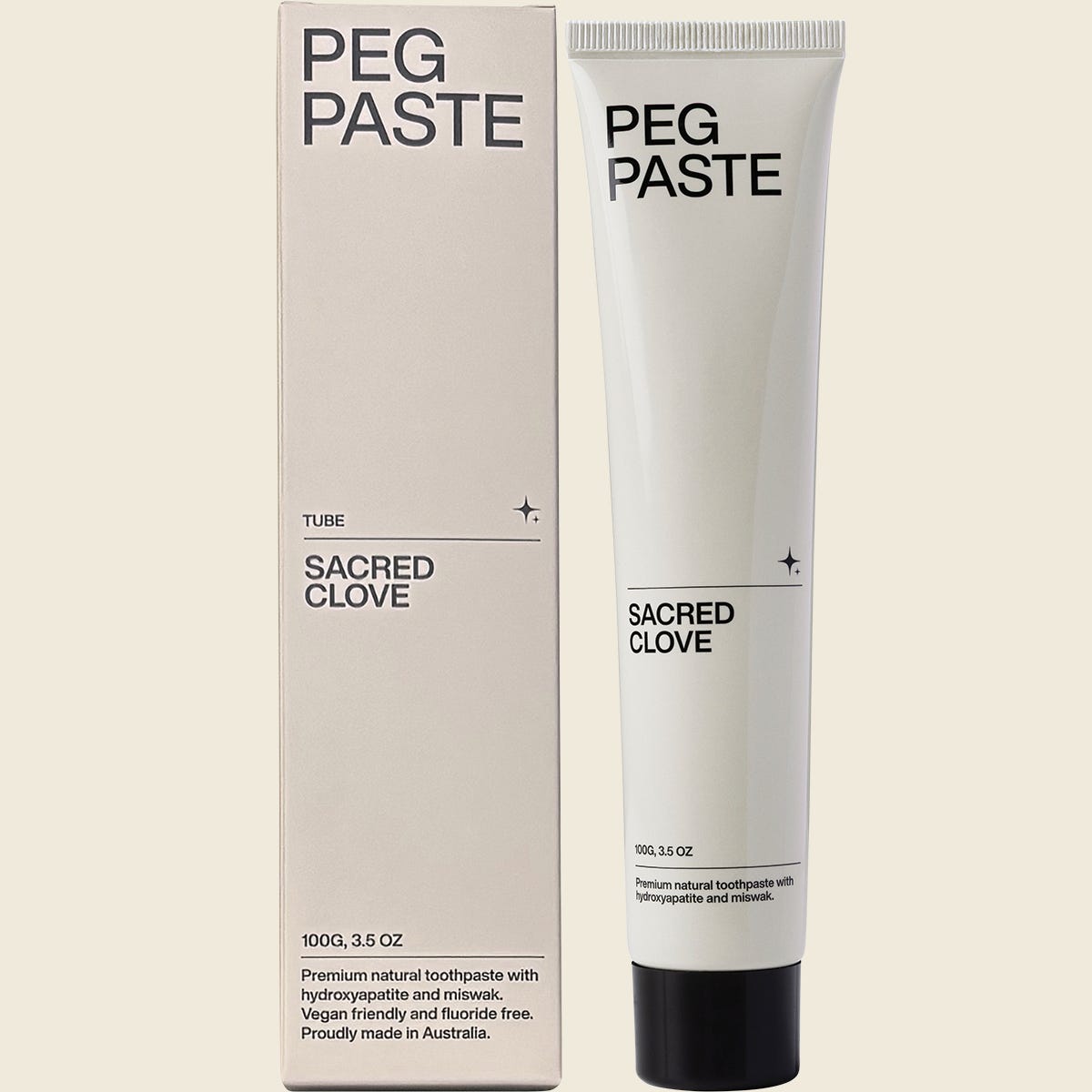 Peg Paste Sacred Clove 100g toothpaste tube and box with hydroxyapatite on a white background.