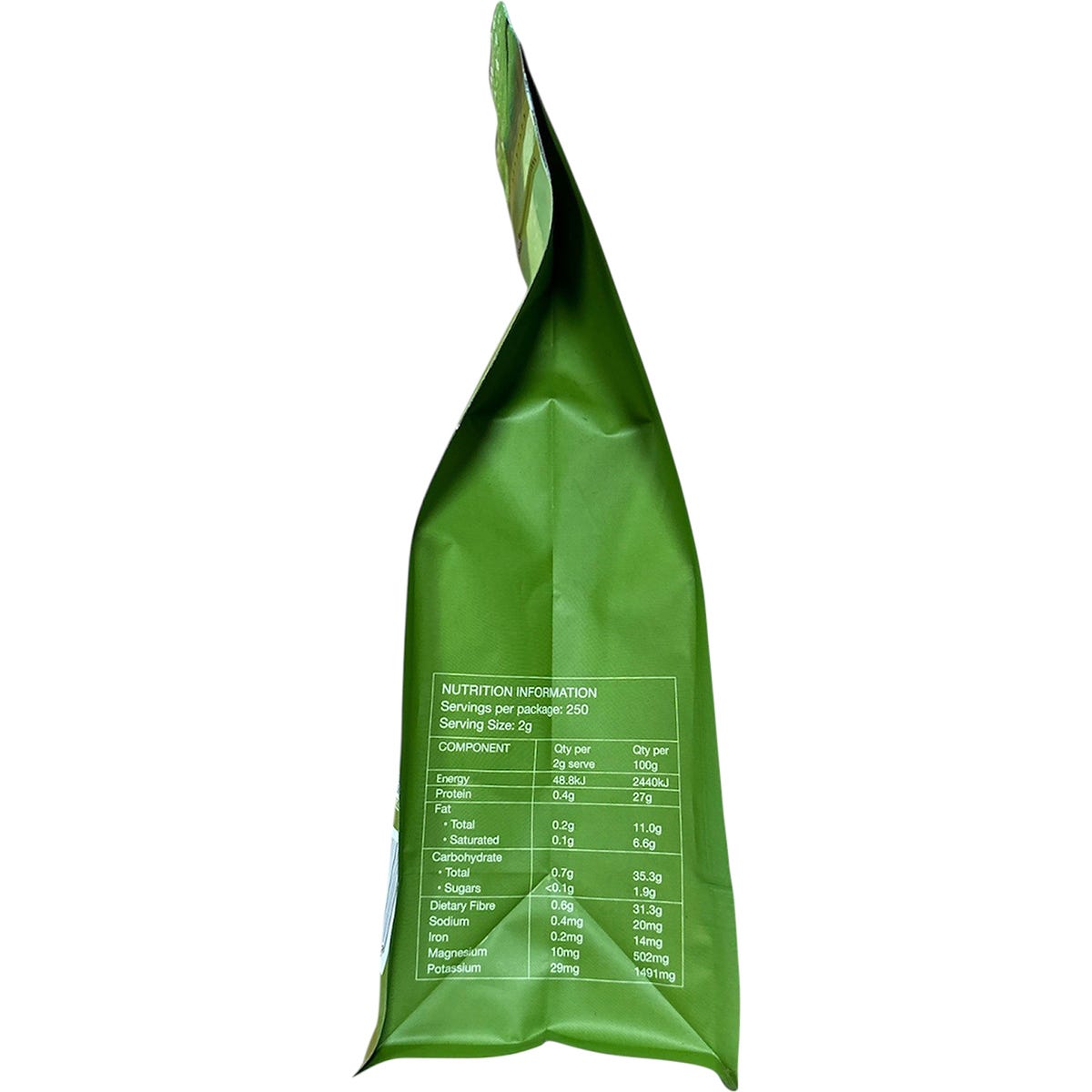 Side view of Planet Organic Cacao Powder 500g bag showing product features and a certified organic logo.