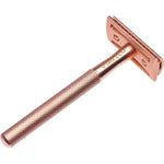 Rose gold Ever Eco safety razor shown from a side profile against a white background.