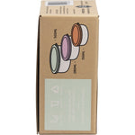 Three round stainless steel nesting containers with mint, blush, and apricot lids viewed from a right-side angle.