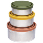 Ever Eco 3-pack nesting stainless steel containers with clay, honey, and olive lids on a wooden surface with food.