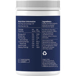 Deep purple organic elderberry powder in a small glass bowl with a wooden spoon on a white background.
