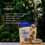 Close-up of multi-colored Natural Life Bee Pollen Granules highlighting their natural texture and floral variety.