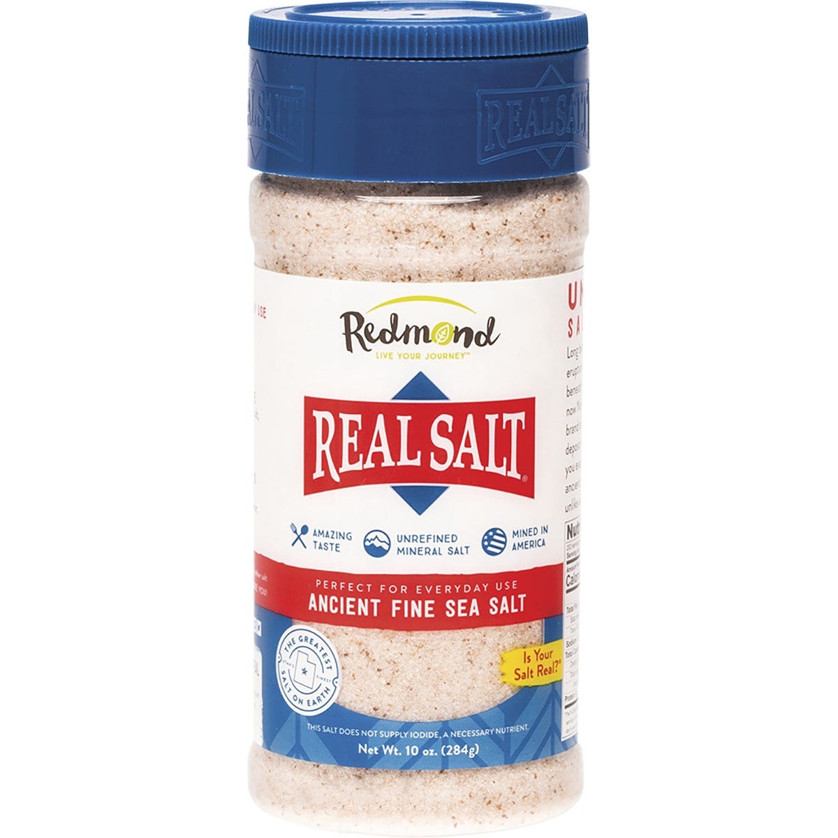 Redmond Real Salt Ancient Sea Salt Fine 284g shaker bottle with a red and white label on a white background.