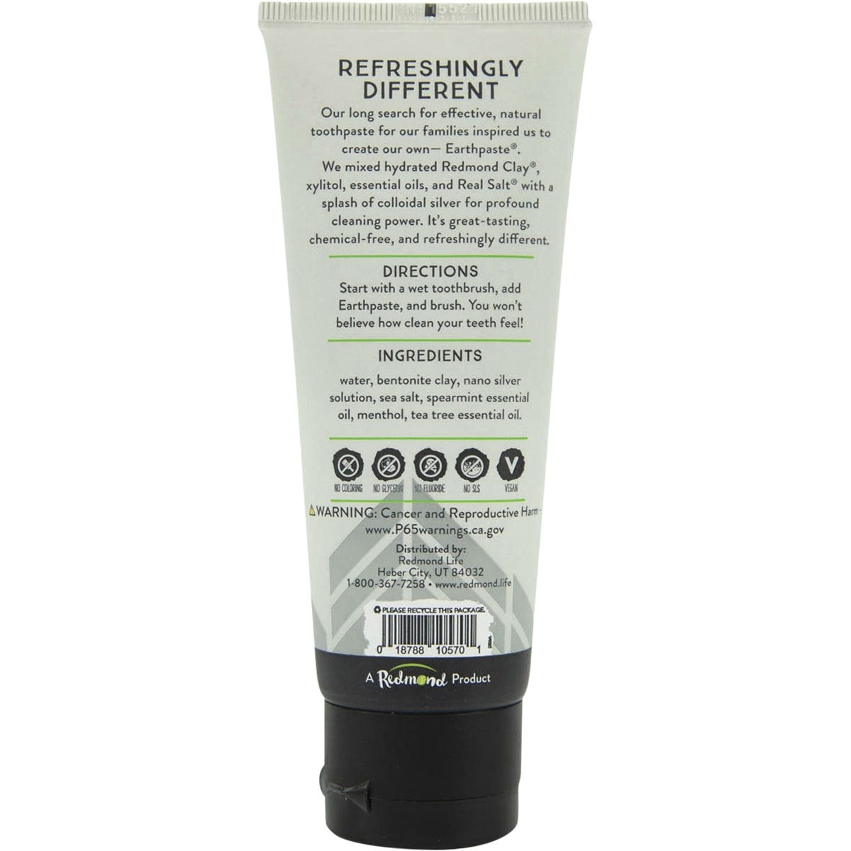Back of Redmond Earthpaste Spearmint tube with ingredients, benefits, and usage instructions on a white background.