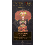 200g block of Sacred Earth Medicine Ceremonial Cacao in white and gold packaging with botanical illustrations.