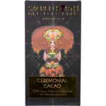 Sacred Earth Medicine Ceremonial Cacao 400g block in brown cardboard packaging featuring a gold sun and mountain logo.