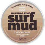 45g tin of Surfmud Natural Zinc Tinted Covering Cream with a tan label and "The Original" text.