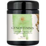 A black plastic jar of Superfeast Gynostemma adaptogenic longevity tea, featuring a white label with a light green watercolor design and gold accents.