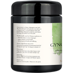 A black plastic bottle of Gyno Menstrual Support Tonic with a white and green label, shown against a plain white background.