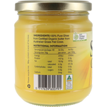 A glass jar of organic butter with a silver metal lid and a yellow label showing ingredients and nutritional information, photographed against a plain white background.