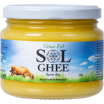 275g glass jar of Sol Organics Grass Fed Ghee with a yellow label and gold lid on a white background.