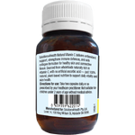 Back view of an amber plastic bottle with a white ribbed cap, showing the product label text for Solutions4Health Natural Vitamin C on a white background.