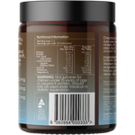Back view of a brown plastic supplement jar with a black lid, showing the nutritional information panel, warning label, and barcode on a white background.