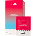 Sodii Salty Raspberry 30-pack box with a sachet and glass of pink electrolyte drink on a neutral background.