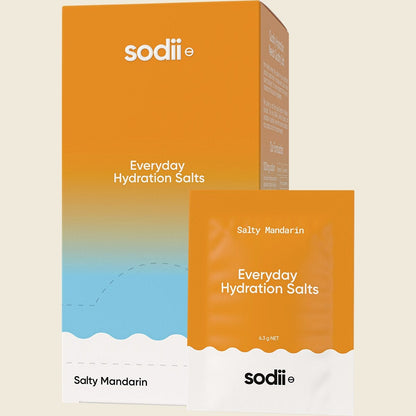 Sodii Salty Mandarin 30-pack box and single sachet of everyday hydration salts with electrolyte icons.