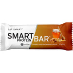 Caramel Honey Macadamia Smart Protein Bar 60g in its individual white and gold wrapper on a plain white background.