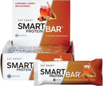 Caramel Honey Macadamia Smart Protein Bar 12-pack box and individual 60g bar with honeycomb and nut illustrations.