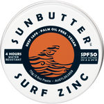 70g tin of SunButter SPF50 Surf Zinc with a tan-colored label featuring a wave design and plastic-free packaging.