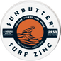 70g tin of SunButter SPF50 Surf Zinc with a tan-colored label featuring a wave design and plastic-free packaging.