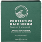 70ml tin of SunButter Protective Hair Serum with a white and blue label featuring rosemary and waves.