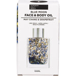 Blue Moon Face and Body Oil in a white gift box with floral illustrations and a gold label.
