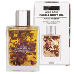 Summer Salt Body Wild Rose Face and Body Oil 100ml bottle and box with 24K gold and rose quartz on a white background.