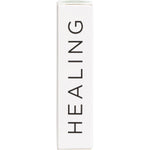 Left side of a white Summer Salt Body 24K Gold Healing box showing directions for use and a list of essential oil ingredients.