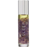 10ml Summer Salt Body 24K Gold Sleep oil roller with an amethyst rollerball and purple crystals in a glass bottle.