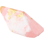 Pink and white Rose Quartz Jasmine crystal bath bomb with gold foil flecks on a white background.