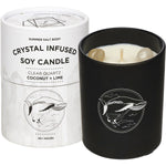 Clear Quartz infused soy candle in a glass jar with coconut and lime scent, next to its illustrated packaging box.
