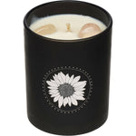 Summer Salt Body crystal-infused soy candle in a glass jar with Rose Quartz and a salted caramel scent.