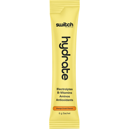Side view of an Orange Crush Switch Nutrition Hydrate 20-pack box with orange illustrations on a white background.