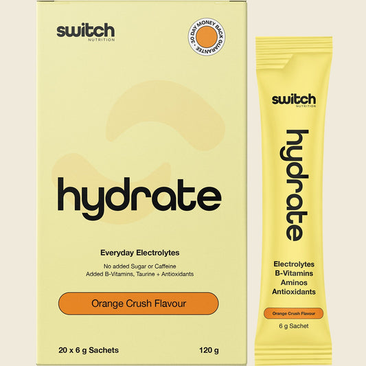Switch Nutrition Hydrate Electrolytes Orange Crush 20-pack box and individual 6g sachet with orange illustrations.