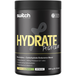 600g tub of Switch Nutrition Hydrate+ Lemon Lime electrolytes and carbohydrates with a bright yellow and green label.