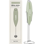 Sage green Switch Nutrition Whiz Stick electric handheld mixer with a silver whisk attachment and a matching storage stand.