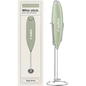 Sage green Switch Nutrition Whiz Stick electric handheld mixer with a silver whisk attachment and a matching storage stand.