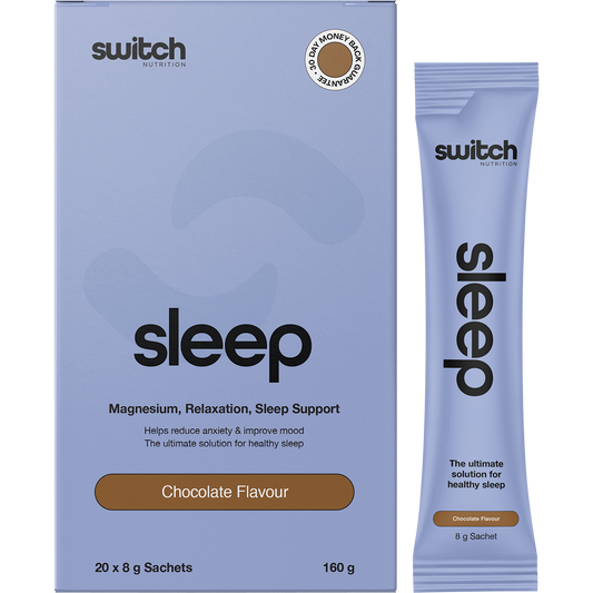 Box and individual chocolate sleep magnesium sachets by Switch Nutrition on a white background.