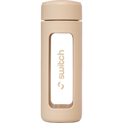 Switch Nutrition 460ml glass water bottle with a beige silicone sleeve and a built-in tea strainer.