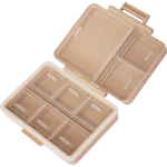 Open wheat-colored 9-grid pill organizer showing nine storage compartments for supplements.