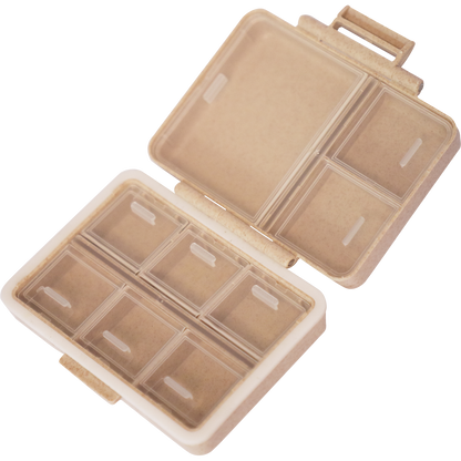 Open wheat-colored 9-grid pill organizer showing nine storage compartments for supplements.