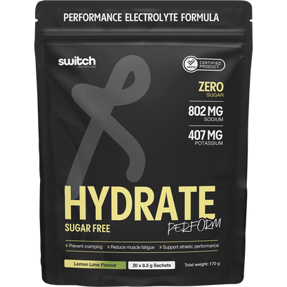 Single 8.5g lemon lime Switch Nutrition Hydrate Perform sachet with green and yellow accents on a white background.