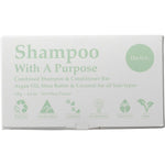 Shampoo With A Purpose The O.G. shampoo and conditioner bar in a white and blue box with a line-art portrait.
