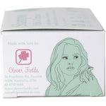 Side view of a Shampoo With A Purpose The O.G. bar box highlighting its 3-in-1 use for hair, face, and body.