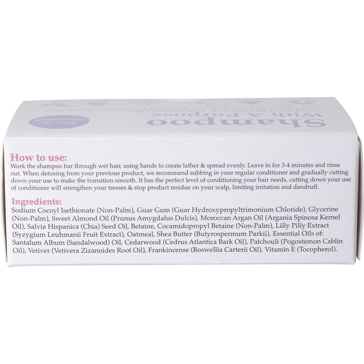 Top view of a Shampoo With A Purpose bar box for dry hair, featuring purple and blue floral patterns on white.