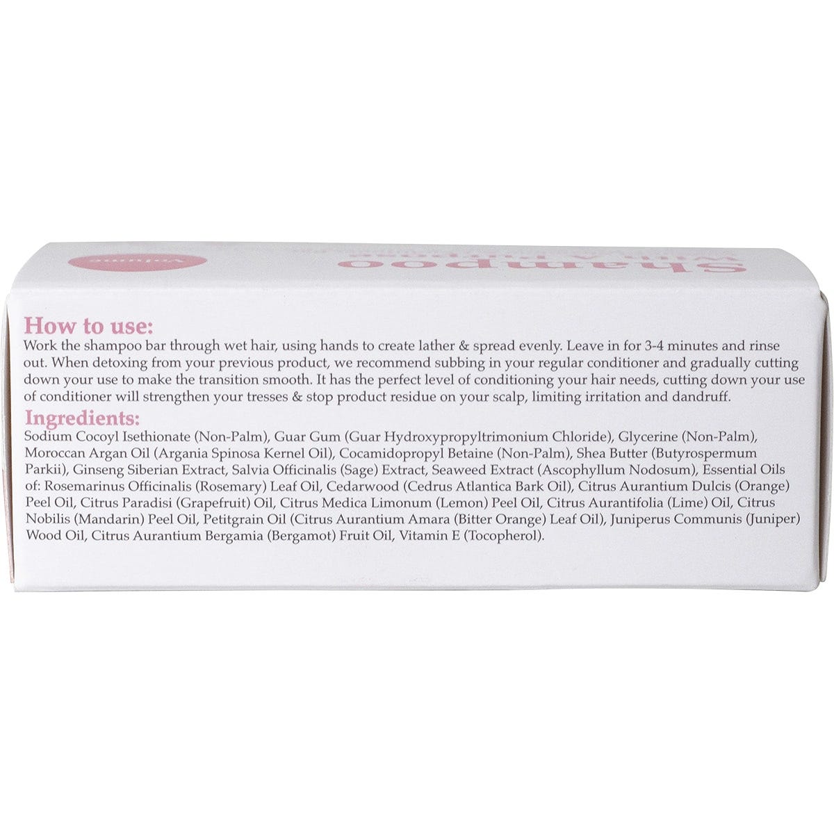 Top of a Shampoo With A Purpose Volume bar box showing a circular cutout with a view of the solid bar inside.