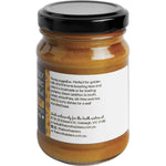 Right side of a 170g jar of The Broth Sisters Activated Turmeric and Ginger Paste showing product uses and benefits.