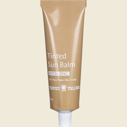 70ml tub of Thrive Tallow Tinted Sun Balm with Zinc featuring a natural, grass-fed formula on a white background.